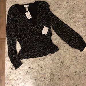 Long sleeve floral shirt. New!